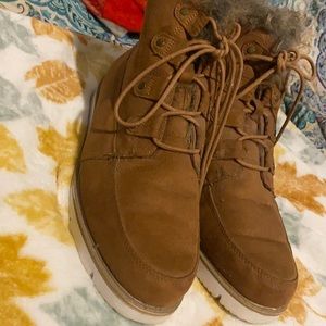 Brown swayed boots